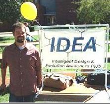 A friendly IDEA Club member with one of the high quality vinyl signs we provide to each club.