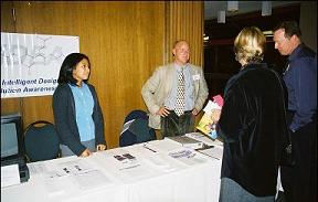 IDEA Center staff converse with attendees at the IDEA Conference 2002